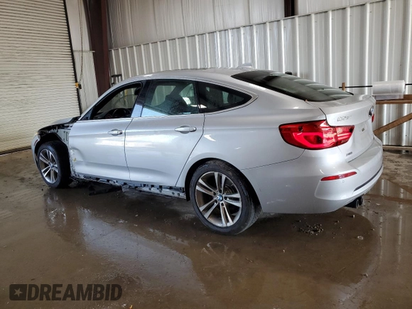 2018 BMW 3 Series 330i xDrive with VIN WBA8Z9C52JG828741, listed as a Copart auction lot 61457015 with 87,064 mi miles and Salvage title. Bid and sale history available at DreamBid. Image 2.