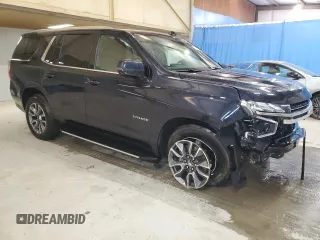 2023 Chevrolet Tahoe LT with VIN 1GNSCNKD0PR380094, listed as a Copart auction lot 48987865 with 51,372 mi miles and Clean title. Bid and sale history available at DreamBid. Image 4.
