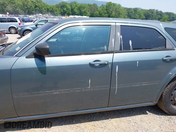 2005 Dodge Magnum z VIN 2D4FV48T35H624544, wystawiony jako IAAI lot #42405272 z przebiegiem 245 529 mil mil oraz . Historia ofert i sprzedaży dostępna na DreamBid. Obrazek 14.