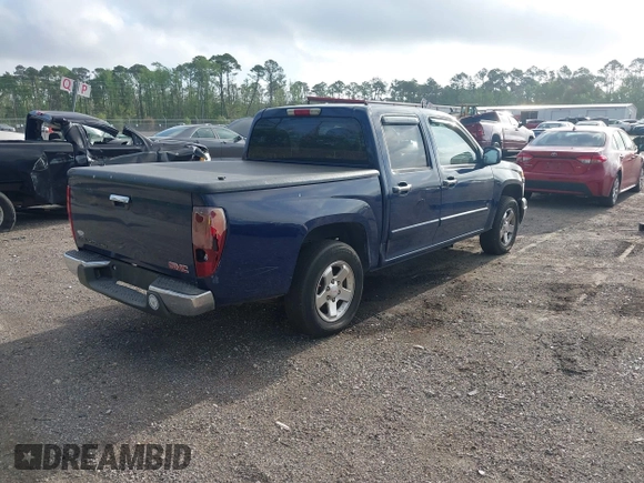 2009 GMC Canyon SLE1 with VIN 1GTCS139298121036, listed as a IAAI auction lot 41953007 with 230,957 mi miles. Bid and sale history available at carsss.com. Image 4.