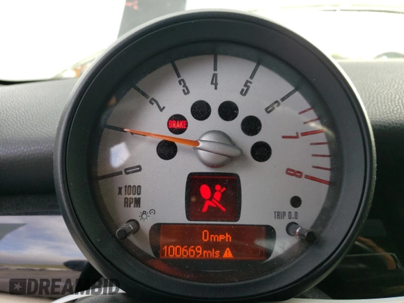 2012 MINI Hardtop with VIN WMWSU3C51CT186184, listed as a Copart auction lot 55090935 with 100,669 mi miles and Salvage Title. Bid and sale history available at DreamBid. Image 9.