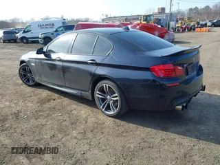 2013 BMW 5 Series 535i xDrive with VIN WBAFU7C50DDU77411, listed as a IAAI auction lot 41796299 with 138,944 mi miles and . Bid and sale history available at carsss.com. Image 3.