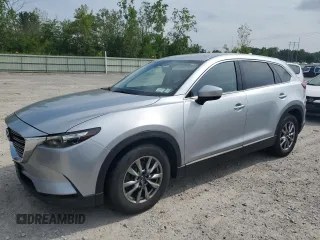 2016 Mazda CX-9 Touring with VIN JM3TCBCY6G0117939, listed as a Copart auction lot 63908405 with 131,602 mi miles and Clean title. Bid and sale history available at DreamBid. Image 1.