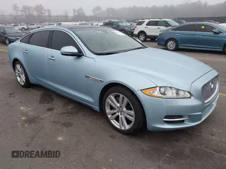 2013 Jaguar XJ with VIN SAJWA2G13DLV57881, listed as a IAAI auction lot 41478667 with 73,764 mi miles. Bid and sale history available at carsss.com. Image 1.