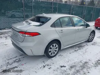 2021 Toyota Corolla LE with VIN 5YFEPMAE9MP175801, listed as a IAAI auction lot 40975110 with 64,488 mi miles. Bid and sale history available at carsss.com. Image 4.