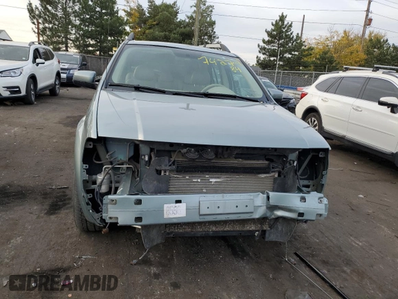 2005 Ford Freestyle Limited with VIN 1FMDK06105GA71334, listed as a Copart auction lot 74270784 with 56,228 mi miles and Salvage Title. Bid and sale history available at carsss.com. Image 5.