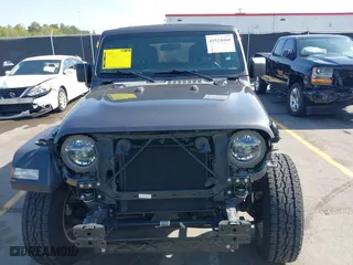 2020 Jeep Wrangler Unlimited Sport Altitude with VIN 1C4HJXDG7LW215344, listed as a IAAI auction lot 41924460 with 51,802 mi miles. Bid and sale history available at carsss.com. Image 13.