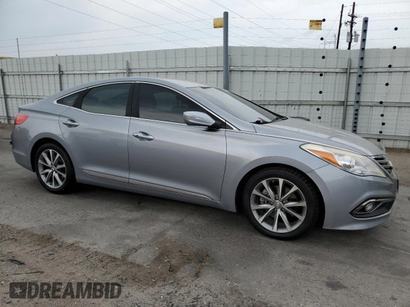 2016 Hyundai Azera z VIN KMHFG4JG2GA506616, wystawiony jako Copart lot #65019115 z przebiegiem 93 770 mil mil oraz Czysty tytuł • Clean title. Historia ofert i sprzedaży dostępna na DreamBid. Obrazek 4.