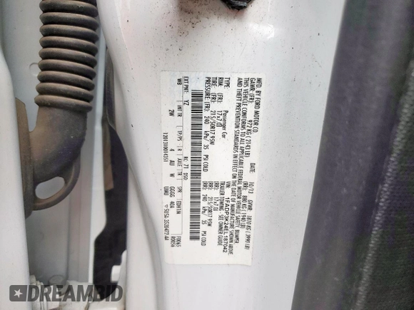 2014 Ford Focus SE z VIN 1FADP3K24EL187042, wystawiony jako Copart lot #57636395 z przebiegiem 105 918 mil mil oraz Szkoda całkowita • Salvage title. Historia ofert i sprzedaży dostępna na DreamBid. Obrazek 12.
