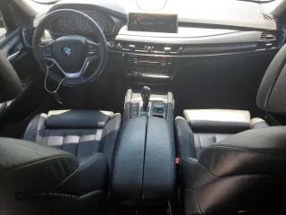 2015 BMW X5 xDrive35i z VIN 5UXKR0C52F0P12247, wystawiony jako Copart lot #54955465 z przebiegiem 87 315 mil mil oraz Szkoda całkowita • Salvage title. Historia ofert i sprzedaży dostępna na DreamBid. Obrazek 8.