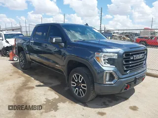 2021 GMC Sierra 1500 AT4 with VIN 1GTP9EED4MZ348768, listed as a IAAI auction lot 40190373 with 55,110 mi miles. Bid and sale history available at carsss.com. Image 1.