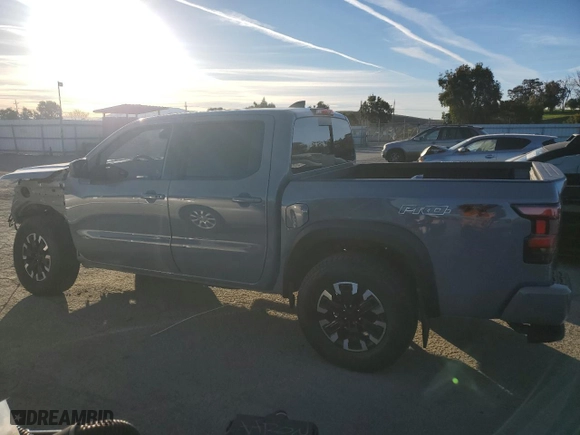 2023 Nissan Frontier PRO-4X with VIN 1N6ED1EK4PN669702, listed as a Copart auction lot 41687475 with 8,855 mi miles and Salvage Title. Bid and sale history available at carsss.com. Image 2.