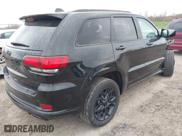 2021 Jeep Grand Cherokee 80th Anniversary with VIN 1C4RJFBG7MC828116, listed as a IAAI auction lot 42118355 with 57,240 mi miles and . Bid and sale history available at DreamBid. Image 4.