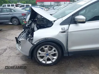 2013 Ford Escape SEL z VIN 1FMCU9H97DUA34665, wystawiony jako IAAI lot #42258567 z przebiegiem 174 227 mil mil oraz . Historia ofert i sprzedaży dostępna na DreamBid. Obrazek 18.