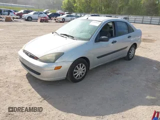 2003 Ford Focus LX with VIN 1FAFP33P83W239710, listed as a IAAI auction lot 42035643 with 178,016 mi miles and . Bid and sale history available at carsss.com. Image 2.