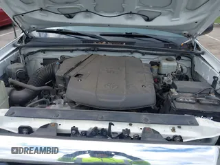 2015 Toyota Tacoma with VIN 5TFLU4EN6FX120947, listed as a IAAI auction lot 42043239 with 125,480 mi miles and . Bid and sale history available at DreamBid. Image 10.