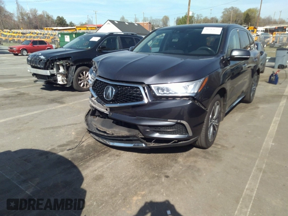 2020 Acura MDX Technology z VIN 5J8YD4H58LL056559, wystawiony jako IAAI lot #41919672 z przebiegiem 63 712 mil mil oraz . Historia ofert i sprzedaży dostępna na DreamBid. Obrazek 21.