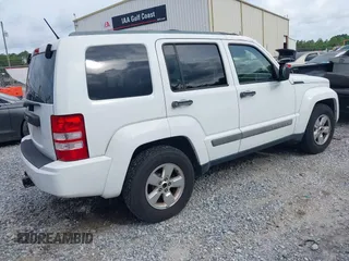 2012 Jeep Liberty Sport Latitude z VIN 1C4PJLAKXCW145609, wystawiony jako IAAI lot #42342281 z przebiegiem 107 256 mil mil oraz . Historia ofert i sprzedaży dostępna na DreamBid. Obrazek 4.