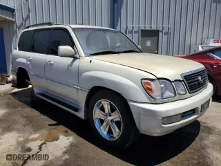 2001 Lexus LX 470 with VIN JTJHT00W613501194, listed as a Copart auction lot 58038914 with 312,193 mi miles and Salvage Title. Bid and sale history available at carsss.com. Image 4.