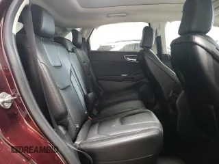 2020 Ford Edge Titanium z VIN 2FMPK4K9XLBA59857, wystawiony jako Copart lot #63559295 z przebiegiem Nie podano mil oraz Szkoda całkowita • Salvage title. Historia ofert i sprzedaży dostępna na DreamBid. Obrazek 11.