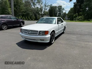 1986 Mercedes-Benz 500 с VIN WDB1260441A193622, выставлен на аукционе Copart как лот 64884565 с пробегом 142 927 миль миль и Чистый • Clean title. История ставок и продаж доступна на DreamBid. Изображение 1.