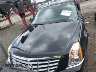 2008 Cadillac DTS 1SA z VIN 1G6KD57Y98U102801, wystawiony jako IAAI lot #42204185 z przebiegiem 152 990 mil mil oraz . Historia ofert i sprzedaży dostępna na DreamBid. Obrazek 14.