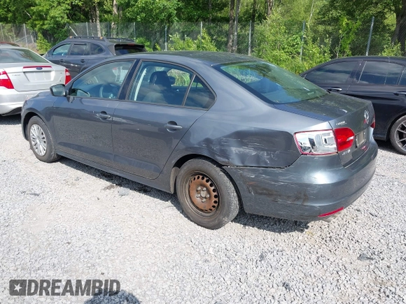 2014 Volkswagen Jetta S with VIN 3VW2K7AJ2EM352047, listed as a IAAI auction lot 42556420 with 104,798 mi miles and . Bid and sale history available at DreamBid. Image 3.