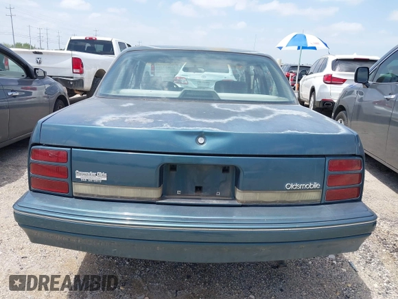 1996 Oldsmobile Cutlass Ciera 1SA VX5 z VIN 1G3AJ55M5T6418193, wystawiony jako IAAI lot #42361441 z przebiegiem 193 675 mil mil oraz . Historia ofert i sprzedaży dostępna na DreamBid. Obrazek 6.