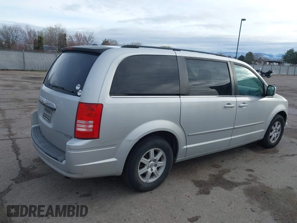 2010 Chrysler Town & Country Touring with VIN 2A4RR5D13AR346526, listed as a IAAI auction lot 41847699 with 271,266 mi miles. Bid and sale history available at carsss.com. Image 4.