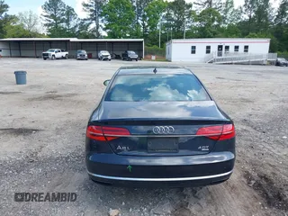 2015 Audi A8 4.0T with VIN WAU32AFD4FN002477, listed as a IAAI auction lot 42157514 with 151,729 mi miles and . Bid and sale history available at DreamBid. Image 16.
