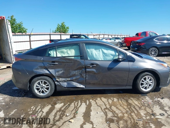 2017 Toyota Prius Two z VIN JTDKARFU8H3539934, wystawiony jako IAAI lot #42295188 z przebiegiem 92 157 mil mil oraz . Historia ofert i sprzedaży dostępna na DreamBid. Obrazek 13.