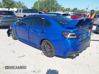 2016 Subaru WRX with VIN JF1VA1B62G9823616, listed as a IAAI auction lot 42028560 with 90,543 mi miles. Bid and sale history available at carsss.com. Image 3.