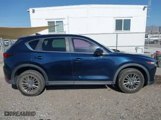 2017 Mazda CX-5 Touring with VIN JM3KFACL5H0180243, listed as a IAAI auction lot 41990818 with 158,977 mi miles. Bid and sale history available at carsss.com. Image 13.