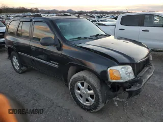 2006 GMC Envoy SLT with VIN 1GKDS13S662220064, listed as a Copart auction lot 84381274 with 237,220 mi miles and Salvage Title. Bid and sale history available at carsss.com. Image 4.