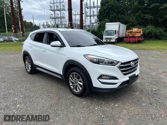 2018 Hyundai Tucson SEL z VIN KM8J33A40JU676727, wystawiony jako Copart lot #87532055 z przebiegiem 128 554 mil mil oraz Czysty tytuł • Clean title. Historia ofert i sprzedaży dostępna na DreamBid. Obrazek 1.