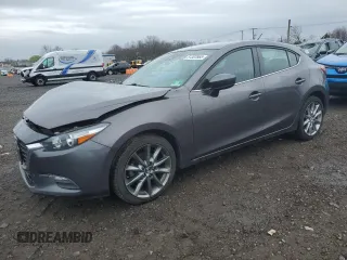 2018 Mazda 3 Touring z VIN 3MZBN1L32JM227238, wystawiony jako Copart lot #51307865 z przebiegiem 49 043 mil mil oraz Szkody całkowita. Historia ofert i sprzedaży dostępna na DreamBid. Obrazek 1.