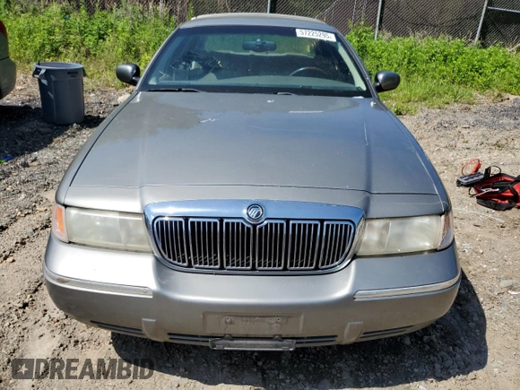 2000 Mercury Grand Marquis LS z VIN 2MEFM75W7YX694301, wystawiony jako Copart lot #57225295 z przebiegiem 141 420 mil mil oraz Szkoda całkowita • Salvage title. Historia ofert i sprzedaży dostępna na DreamBid. Obrazek 5.