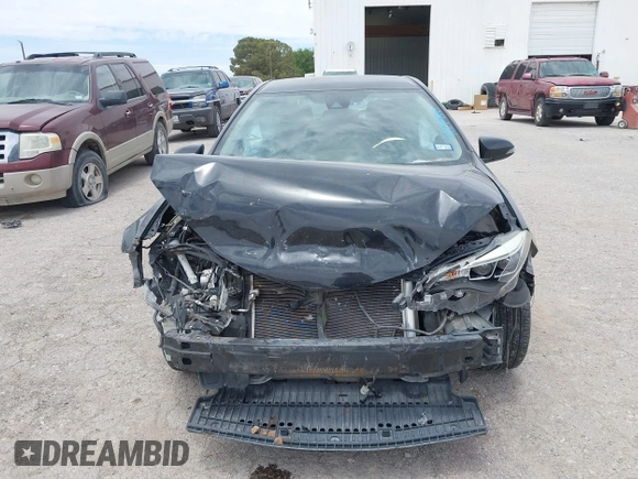 2017 Toyota Corolla L with VIN 2T1BURHE4HC843864, listed as a IAAI auction lot 42274808 with 106,371 mi miles and . Bid and sale history available at DreamBid. Image 12.