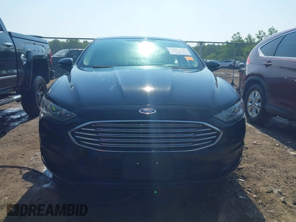 2017 Ford Fusion SE z VIN 3FA6P0H71HR135111, wystawiony jako IAAI lot #42454080 z przebiegiem 120 355 mil mil oraz . Historia ofert i sprzedaży dostępna na DreamBid. Obrazek 12.