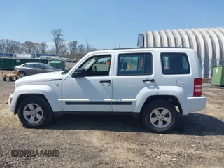 2012 Jeep Liberty Sport z VIN 1C4PJMAK7CW209305, wystawiony jako IAAI lot #42105378 z przebiegiem 136 617 mil mil oraz . Historia ofert i sprzedaży dostępna na DreamBid. Obrazek 14.
