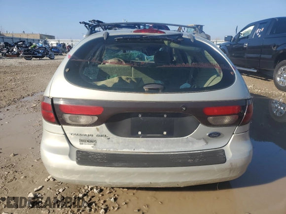 2004 Ford Taurus z VIN 1FAFP59SX4A141848, wystawiony jako Copart lot #79389104 z przebiegiem Nie podano mil oraz Nie do naprawy. Historia ofert i sprzedaży dostępna na DreamBid. Obrazek 6.