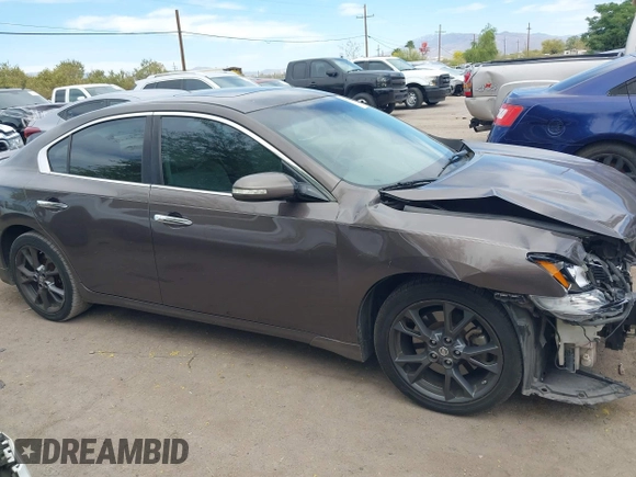 2014 Nissan Maxima S with VIN 1N4AA5AP0EC431251, listed as a IAAI auction lot 42120884 with 163,628 mi miles and . Bid and sale history available at DreamBid. Image 14.