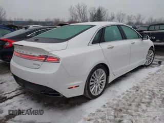 2016 Lincoln MKZ with VIN 3LN6L2G9XGR611001, listed as a IAAI auction lot 41556560 with 95,490 mi miles and . Bid and sale history available at DreamBid. Image 4.