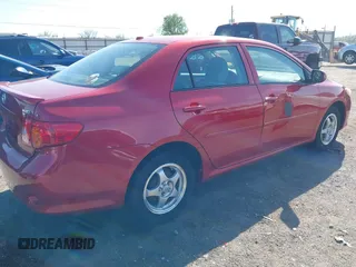 2009 Toyota Corolla with VIN 1NXBU40E99Z122454, listed as a IAAI auction lot 41999898 with 202,958 mi miles. Bid and sale history available at carsss.com. Image 4.