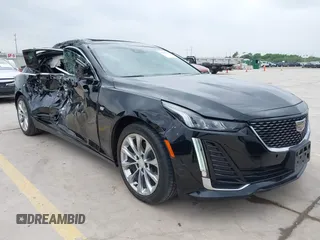2023 Cadillac CT5 Premium Luxury z VIN 1G6DN5RK7P0119990, wystawiony jako IAAI lot #42293014 z przebiegiem 44 690 mil mil oraz . Historia ofert i sprzedaży dostępna na DreamBid. Obrazek 1.