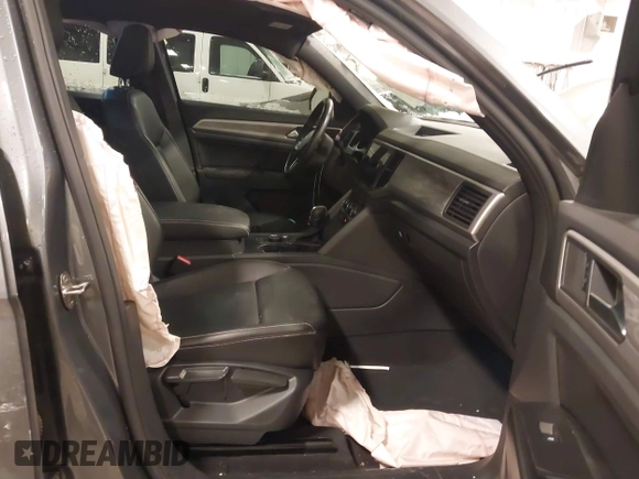 2020 Volkswagen Atlas SE with VIN 1V26E2CA9LC230374, listed as a IAAI auction lot 41336609 with 52,500 mi miles and . Bid and sale history available at DreamBid. Image 5.