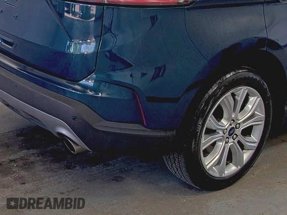 2020 Ford Edge Titanium z VIN 2FMPK3K91LBB37761, wystawiony jako IAAI lot #42829390 z przebiegiem 90 117 mil mil oraz . Historia ofert i sprzedaży dostępna na DreamBid. Obrazek 8.