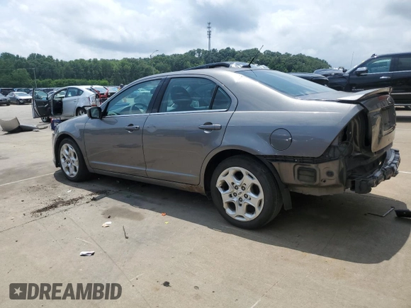 2010 Ford Fusion SE with VIN 3FAHP0HA4AR387638, listed as a Copart auction lot 60649585 with 210,779 mi miles and Salvage title. Bid and sale history available at DreamBid. Image 2.