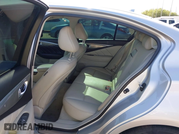 2015 Infiniti Q50 with VIN JN1BV7AR3FM405659, listed as a IAAI auction lot 41949596 with 101,196 mi miles and . Bid and sale history available at DreamBid. Image 8.