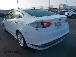 2016 Ford Fusion SE Hybrid with VIN 3FA6P0LU4GR144591, listed as a IAAI auction lot 42592828 with 96,184 mi miles and . Bid and sale history available at DreamBid. Image 3.
